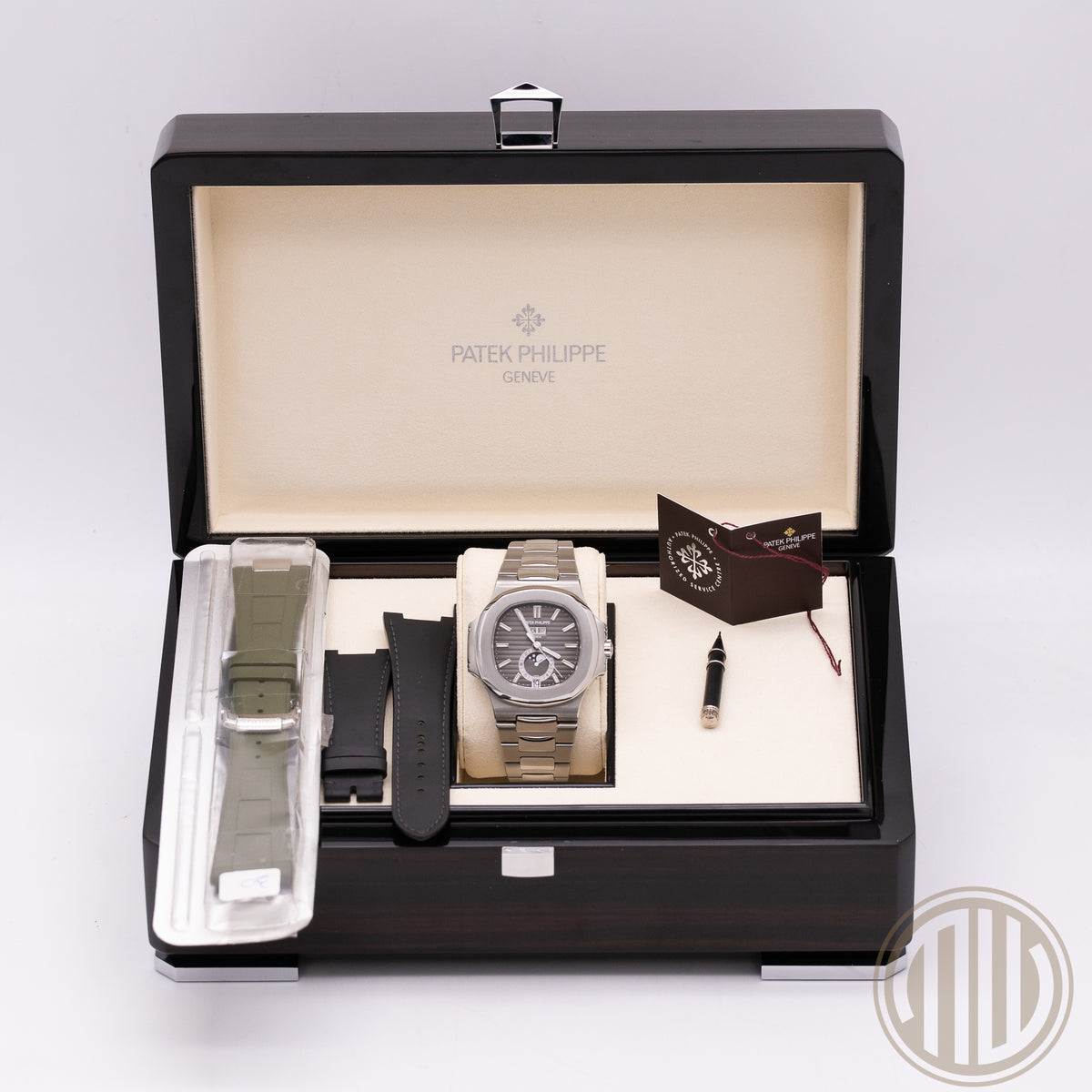 Patek Philippe Nautilus Annual Calendar | New Patek-Service | Box and Papers | 2011