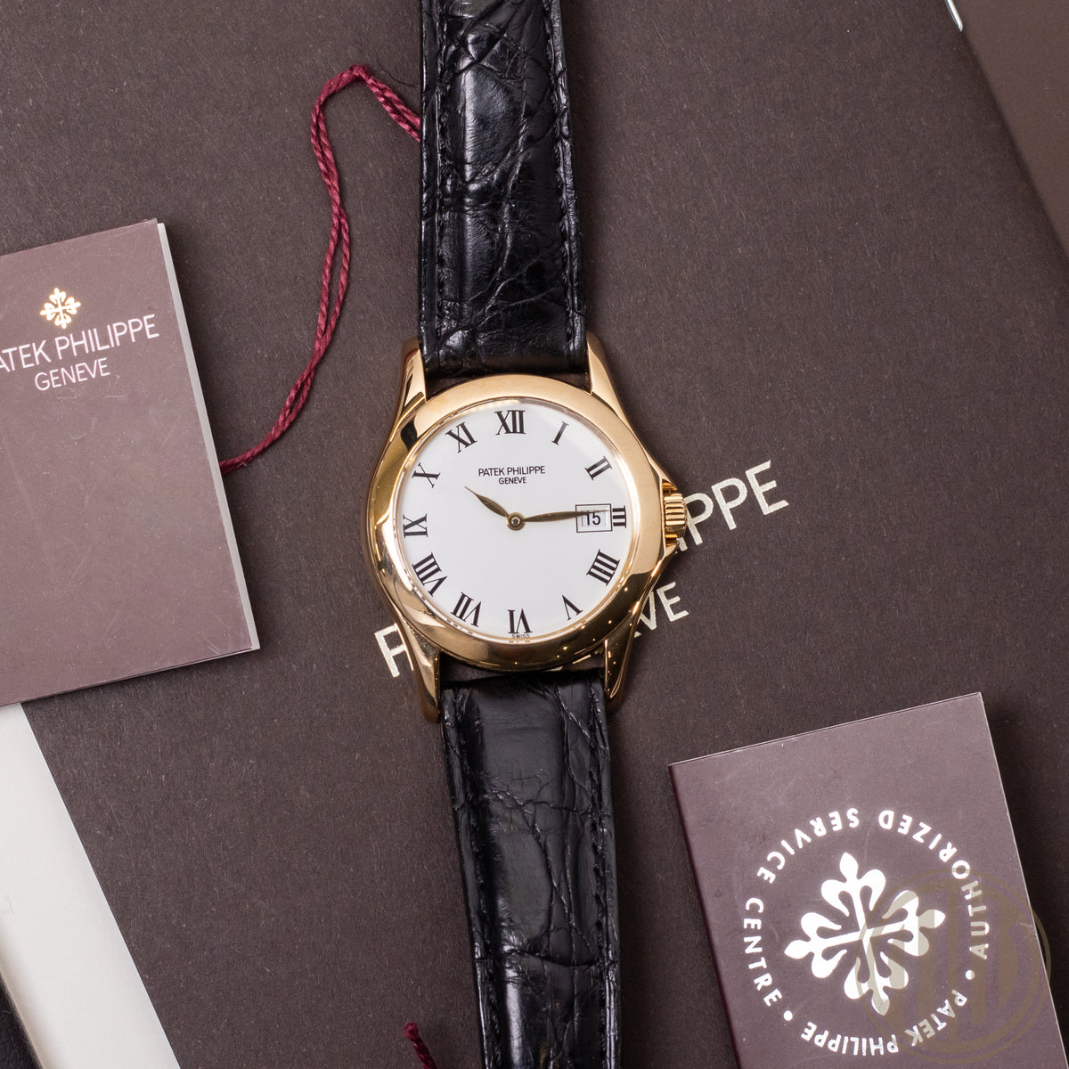 Patek Philippe Calatrava 18ct Yellowgold | White Romand Dial | with Extract