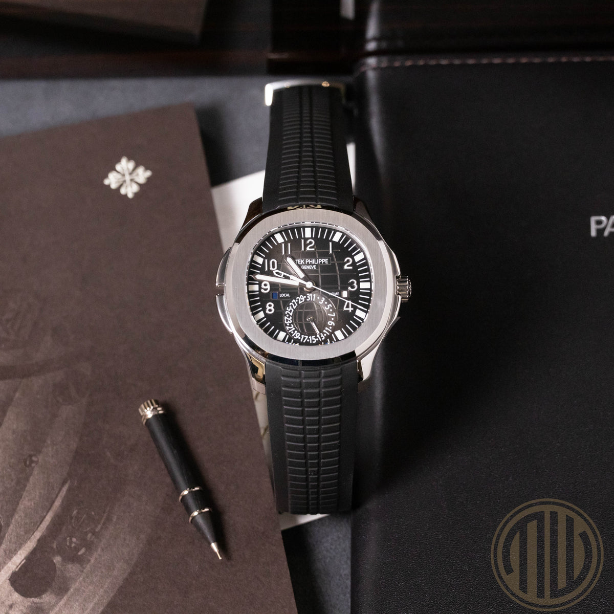 Patek Philippe Aquanaut Travel Time | Uncut-Strap | Top Condition | Box and Papers