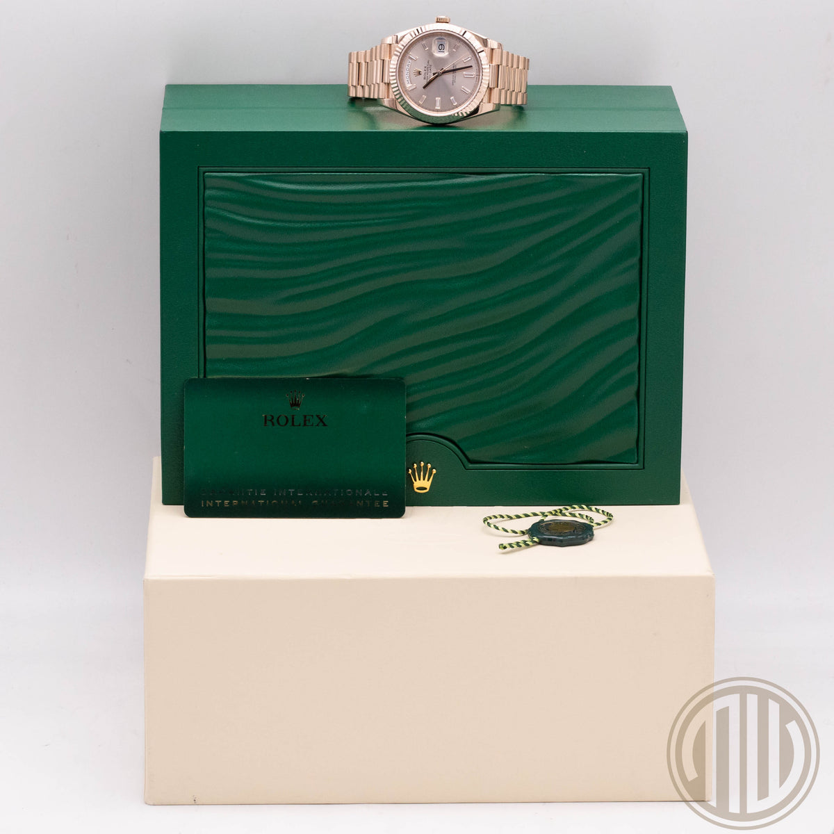 Rolex Day-Date 40 Sundust Baguette Dial | Everose-Gold | Box and Papers | 2020