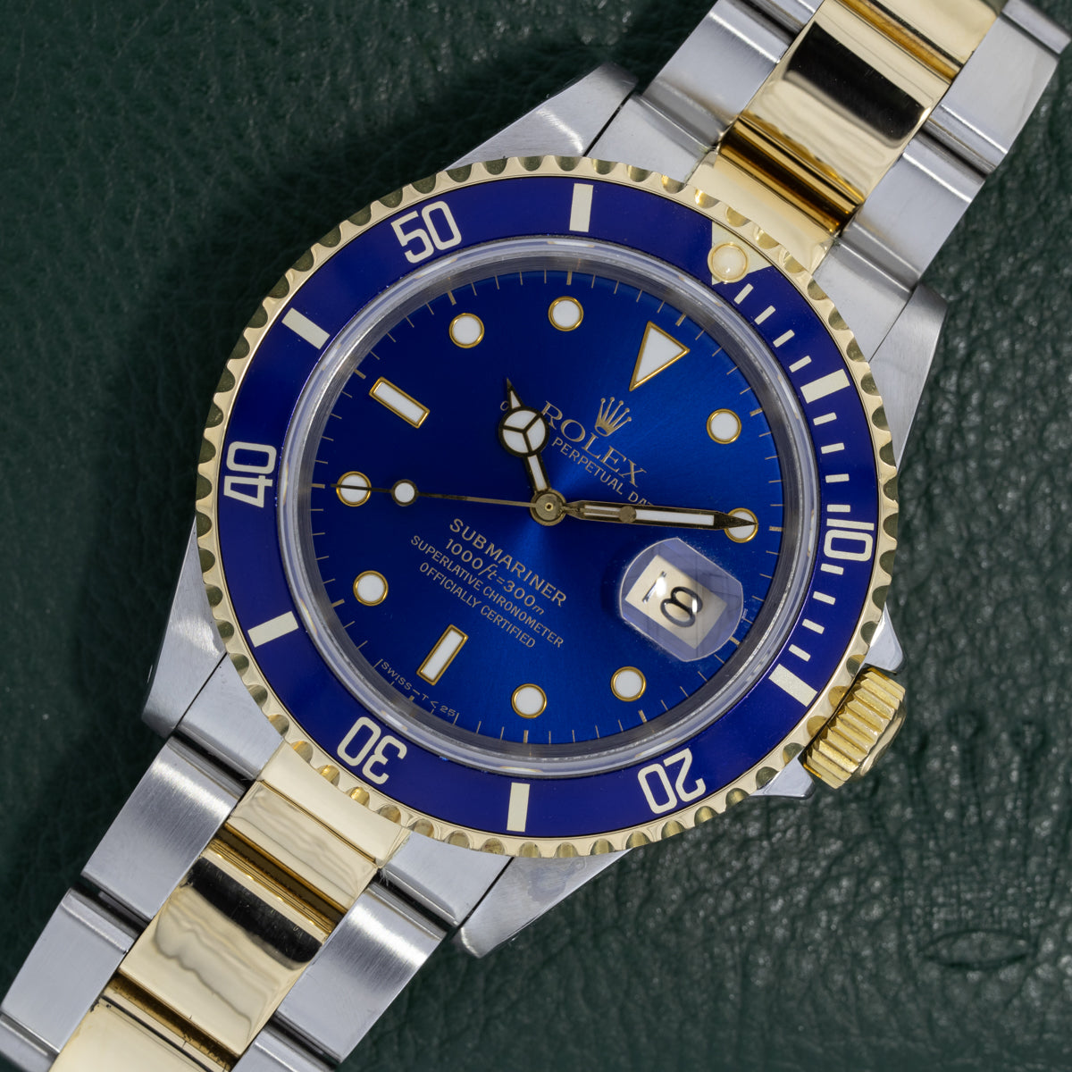 Rolex Submariner Date esfera azul Sundust | Acero/Oro Amarillo | 16613