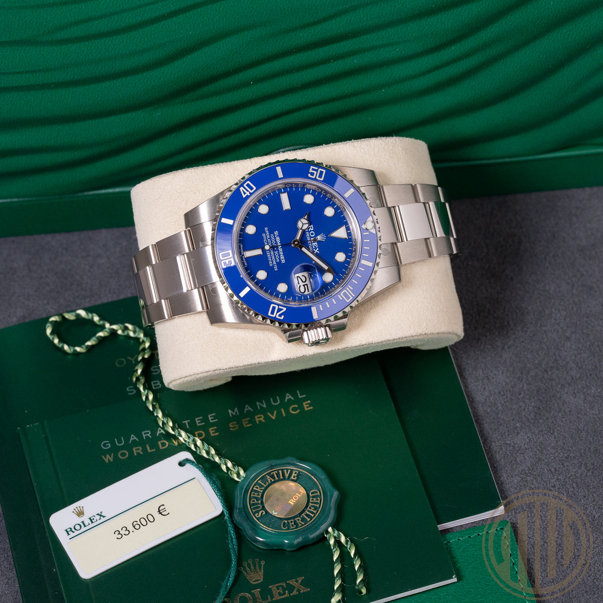 Rolex Submariner Date "Smurf" Full Sticker | 18kt Whitegold | Lc100 | Box and Papers | 2019