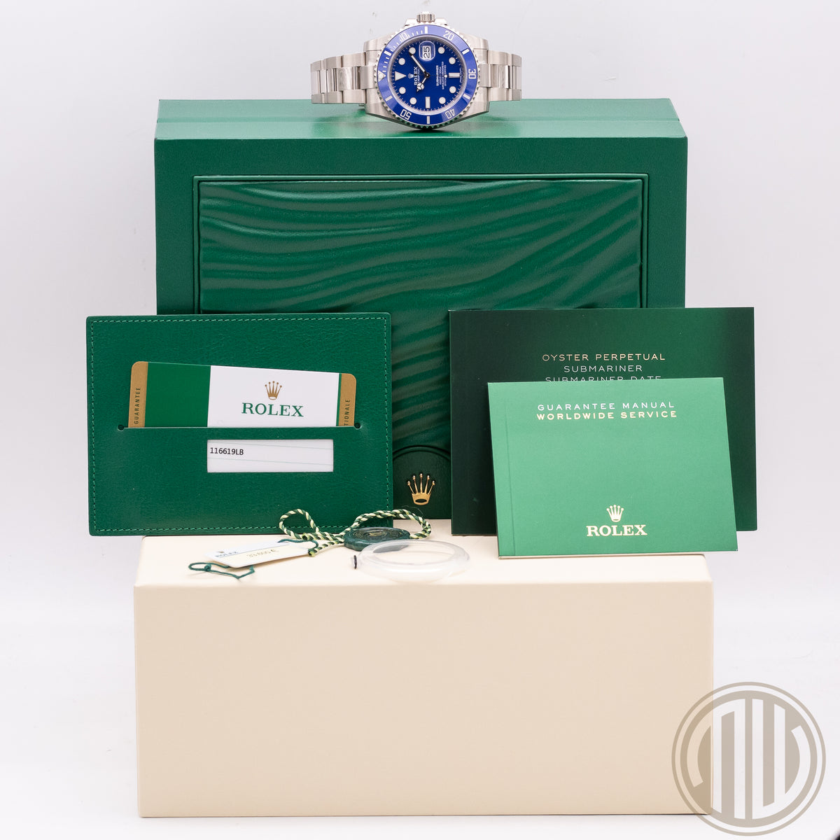 Rolex Submariner Date "Smurf" Full Sticker | 18kt Whitegold | Lc100 | Box and Papers | 2019